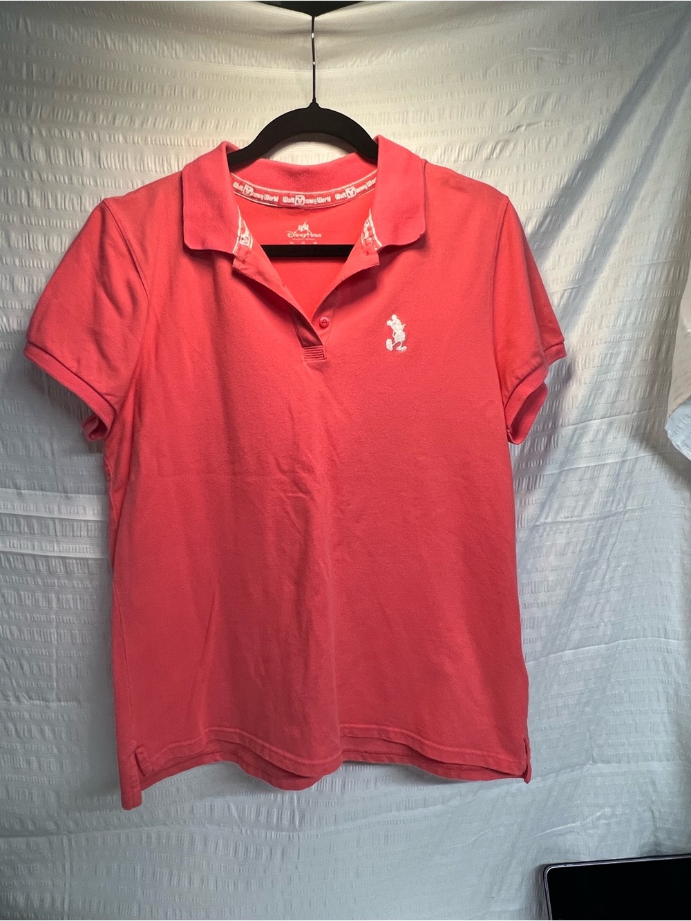 Disney Women's Coral Polo Top with Embroidered Logo